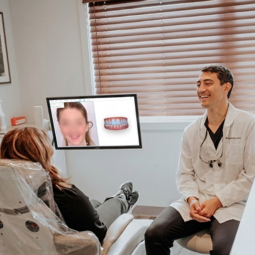 Dentist consulting with patient in clinic